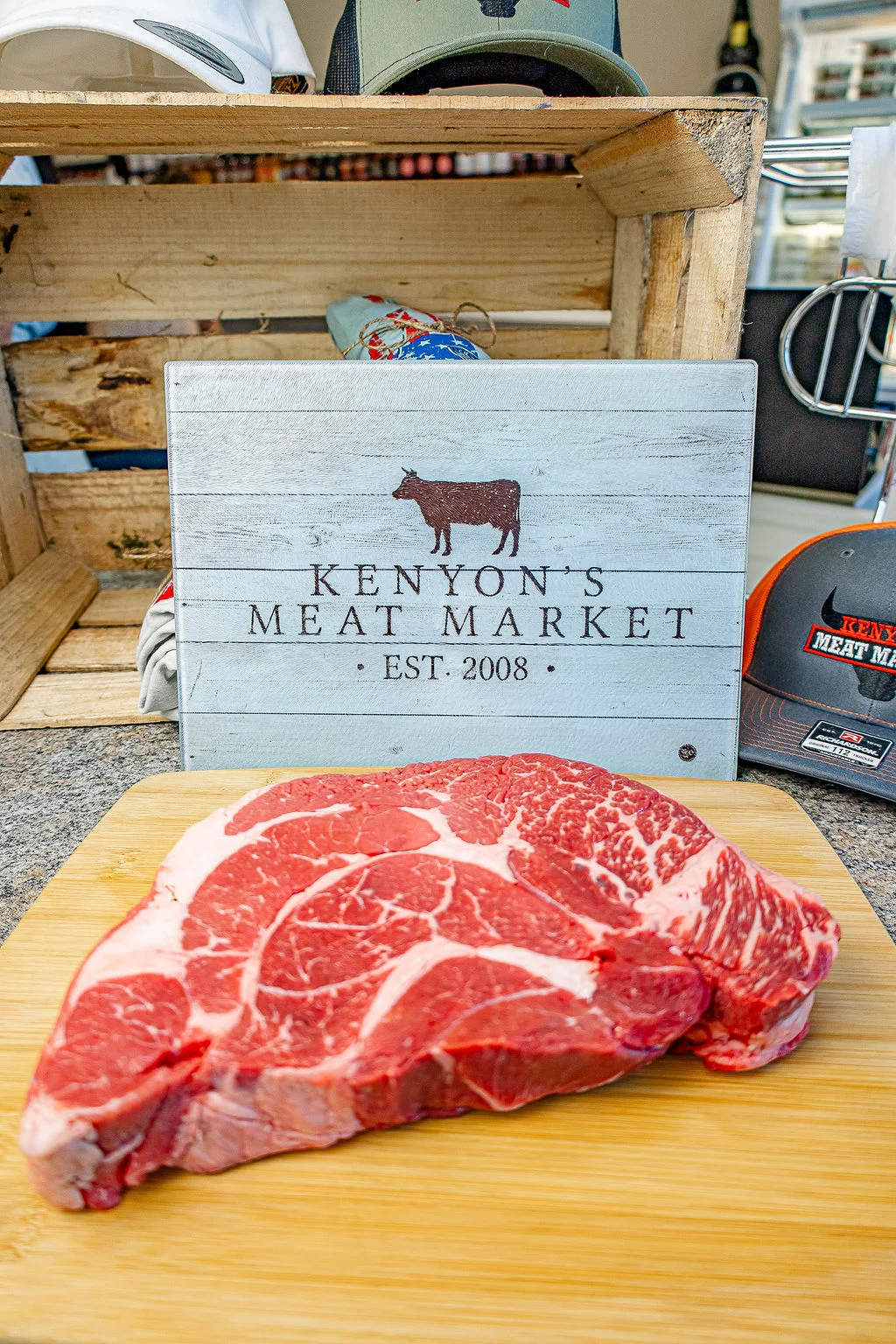 A fresh cut of beef beside the Kenyon’s sign